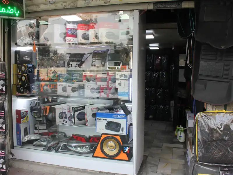 نصب شیشه دودی و آپشن خودرو پرسپولیس در ستارخان